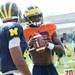 Michigan quarterback Devin Gardner stands with tight end Devin Funchess on the practice field outside of the Al Glick Field House on Thursday, August 8, 2013. Melanie Maxwell | AnnArbor.com 